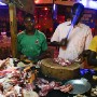 A photograph made available 26 February 2013 shows a chef chopping meat at a roadside restaurant and night club in Ouagadougou which is currently hosting the Panafrican Film and Television Festival in Burkina Faso 25 February 2013. The Panafrican Film and Television Festival of Ouagadougou known as FESPACO is the largest film festival in Africa. Nearly 170 films from all over the continent will be shown during the week long bi-annual festival which ends on 02 March 2013.