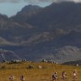 Cyclists climb through a mountain range during stage 6 the penultimate stage in the Absa Cape Epic mountain bike team stage race in Oak Valley, South Africa, 31 March 2012. The Cape Epic is the premier multi day stage race in the world and sees 1200 cyclists riding in pairs over 780km and climbing more than16300 meters, twice the high of Mount Everest over 8 days of racing.