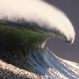 A perfect wave breaks on the Cape Town outer reef known as Sunset off Kommetjie, Cape Town 1998.