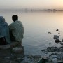 A Sudanese couple watch the sunset on the banks of the river Nile in Khartoum, Sudan Sunday 10 October 2004.<br /><br />