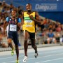 epa02893414 (L-R) Reto Shenkel of Switzerland, Darvis Petton of the US, Usain Bolt of Jamaica and Bruno De Barros of Brazil compete in the men 200m semi final during the 13th IAAF World Championships in Daegu, Republic of Korea, 02 September 2011.  EPA/NIC BOTHMA
