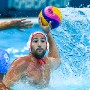 Spain's Blai Mallarach Guell (R) fires a shot past italy'ds Valentino Gallo (L) during the Water Polo Mens Preliminary round Group A match between Italy and Spain