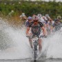 Urs Huber from Switzerland riding in team STÖCKLI Pro leads the pelaton through a river crossing during stage 2 of the Absa Cape Epic mountain bike team stage race in Robertson, South Africa, 27 March 2012. The Absa Cape Epic is the premier multi day stage race in the world and sees 1200 cyclists riding in pairs over 780km and climbing more than16300 meters, twice the high of Mount Everest over 8 days of racing.