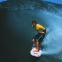 Mozambique 1998<br />Sean Holmes comes out of the barrel at ponto do Ouro.<br />Photo©Nic Bothma/ASI